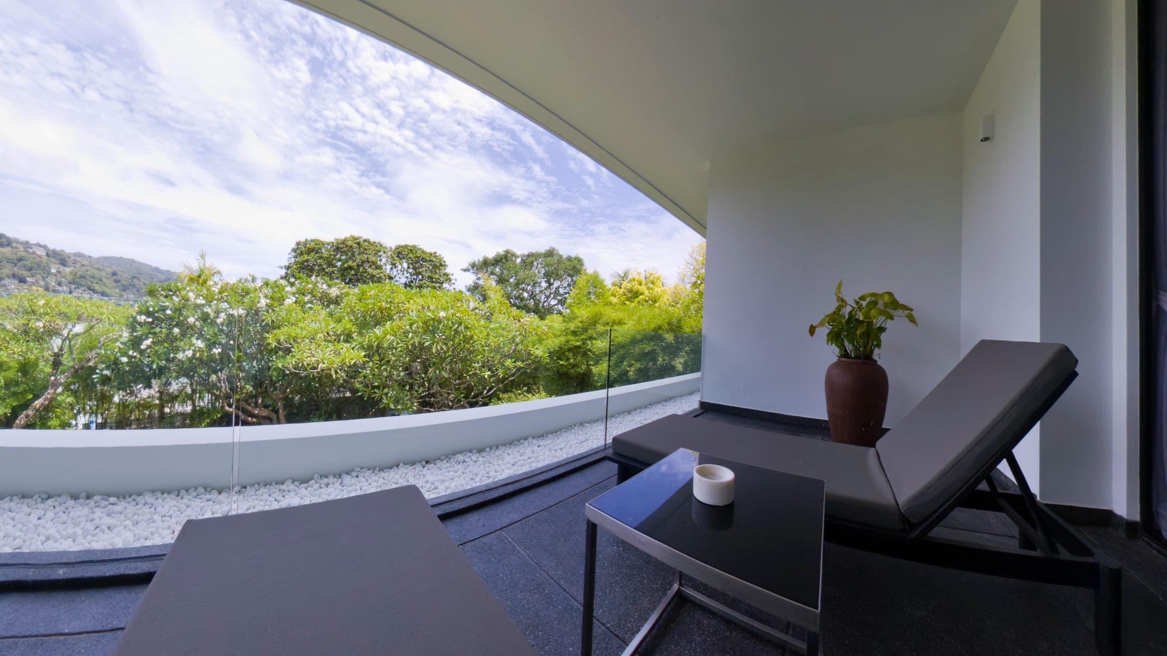 Private balcony of Bedroom 2 with sun lounger